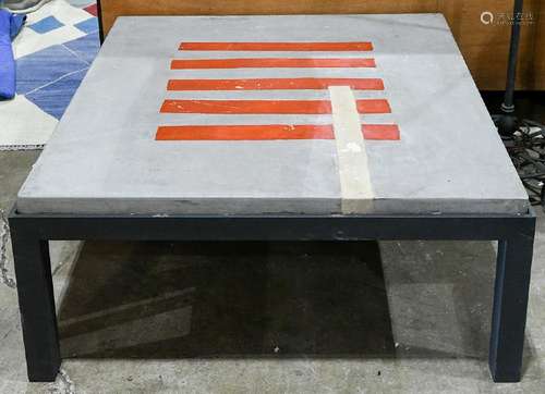 Modern coffee table, having a metal frame and inset