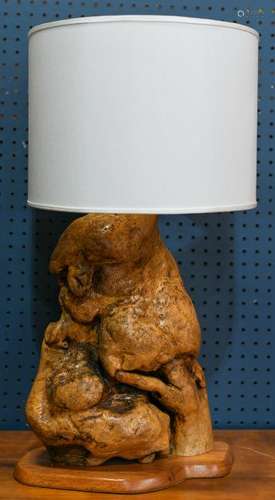 Modern burl wood lamp with a cylindrical linen wrap