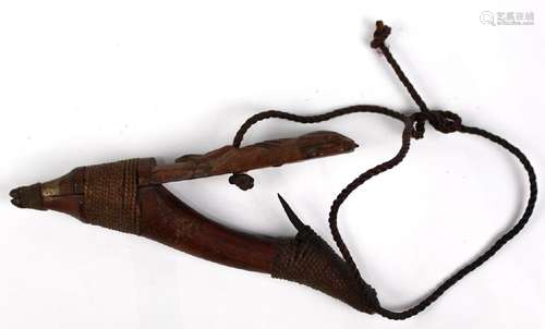 Tlingit cedar carved wood fishing hook, 19th century,