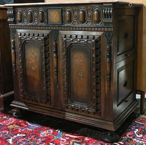 Filing cabinet, the two side drawer case with a carved