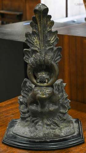 Cast metal wall bracket, depicting a lion with and