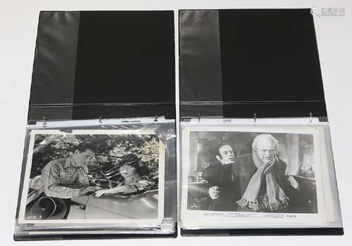 Two binders of movie stills and photographs