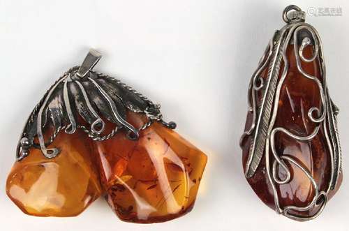 (Lot of 2) Amber and silver pendants