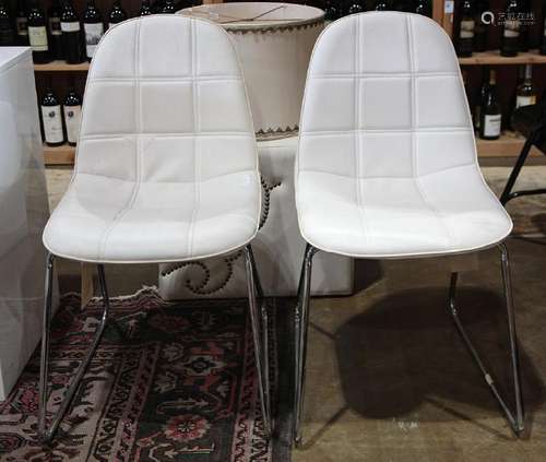 Pair of Eames style side chairs, having a chrome