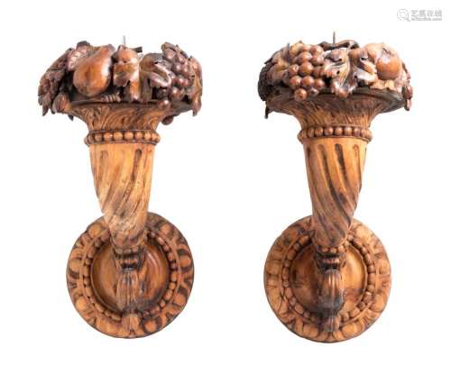 *A Pair of Continental Carved Fruitwood Sconces
