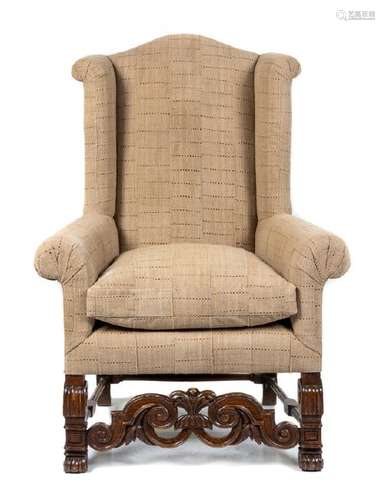 A Jacobean Style Oak Wingback Armchair