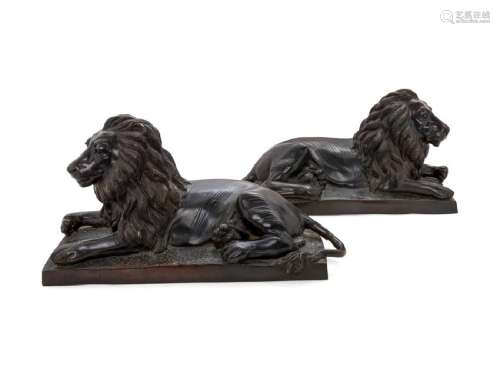 *A Pair of Bronze Models of Recumbent Lions