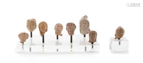 Eight Terra Cotta Votive Heads