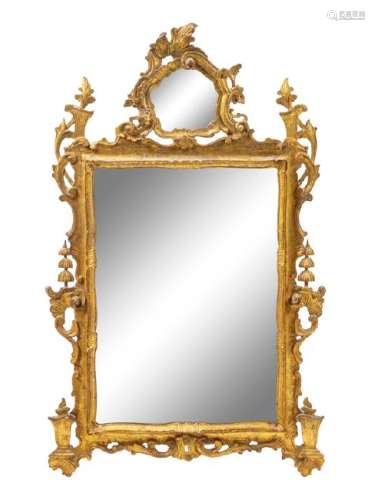 *An Italian Baroque Style Giltwood Mirror