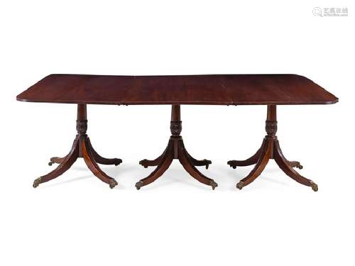 *A Regency Style Mahogany Triple-Pedestal Dining Table