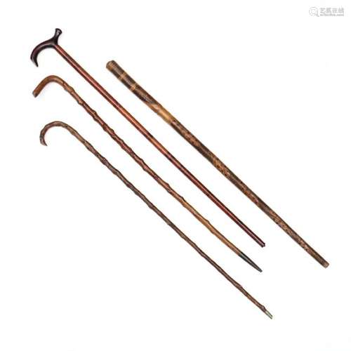 Four Vintage Walking Sticks