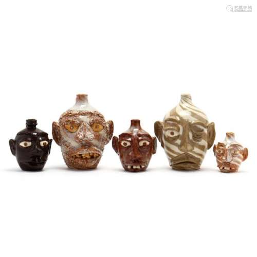 A Group of Folk Art Pottery Face Jugs, G. F. Cole