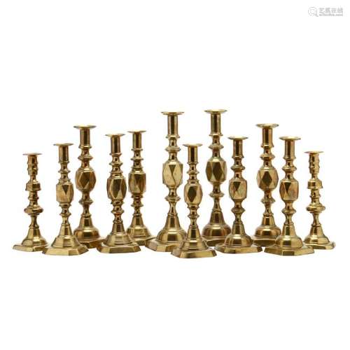 Six Pair of Antique Brass Push-Up Candlesticks