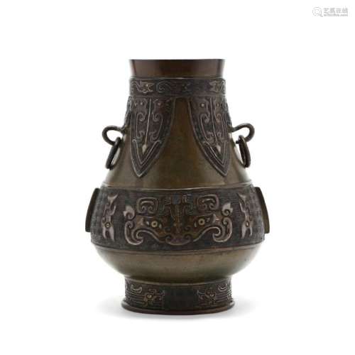 A Chinese Archaic Hu Style Bronze Vessel