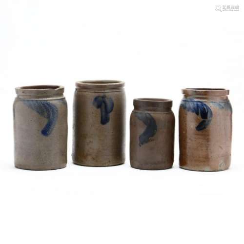 A Group of Four Storage Jars