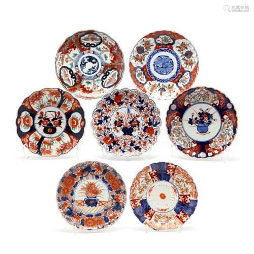 A Group of Seven Antique Imari Plates