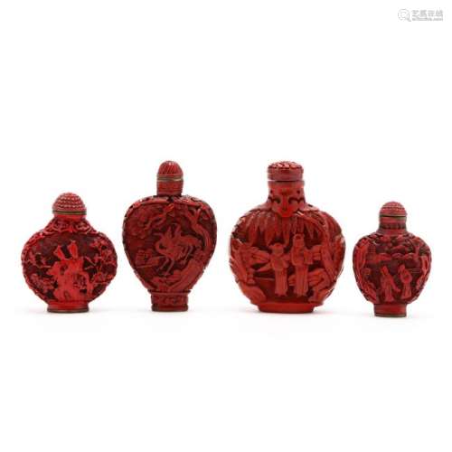 A Group of Four Chinese Cinnabar Lacquer Snuff Bottles