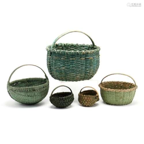 A Group of Five Green Painted Baskets
