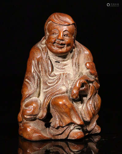 A  CHARACTER CARVED BAMBOO  ORNAMENT