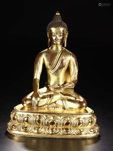 A GILT BRONZE FIGURE OF GUATAMA  BUDDHA