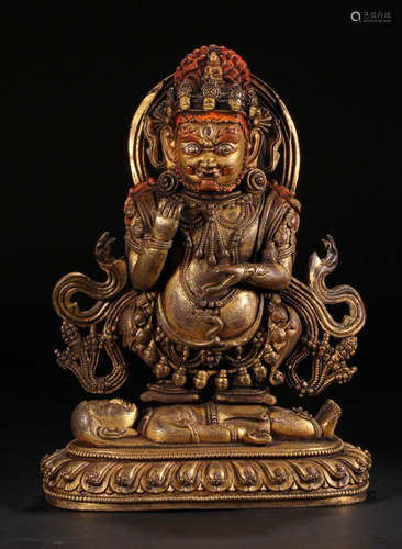 A GILT BRONZE MAHAKALA BUDDHA