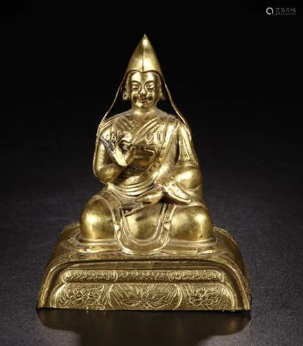 A GILT BRONZE FIGURE OF TSONGKHAPA BUDDHA