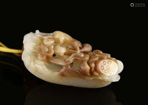 A HETIAN JADE LOTU FLOWER CARVED PENDANT