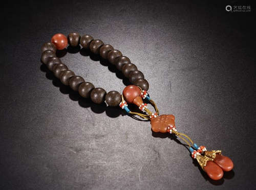 A CHENXIANG WOOD EIGHTEEN BEADS BRACELET