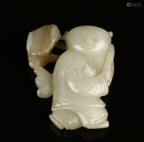 A HETIAN JADE FIGURE OF A KID AND LOTU LEAF ORNAMENT