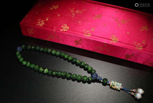 A GREEN TUORMALINE THIRTY SIX BEADS ROSARY