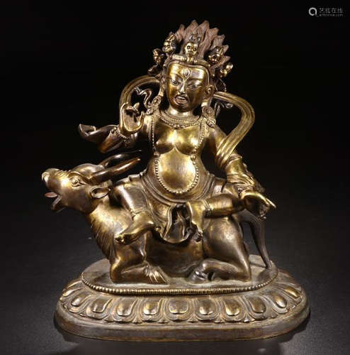 A GILT BRONZE FIGURE OF A SEATED MAHAKALA  BUDDHA