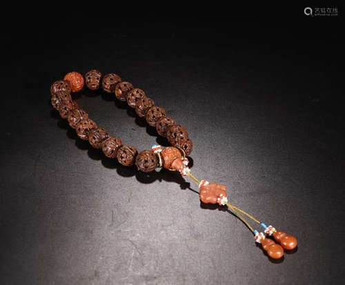 A CHENXAING WOOD FLOWER CCARVED BEADS BARCELET