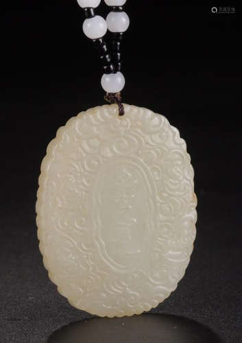 A HETIAN JADE AUSPICIOUS PATTERN CARVED PENDANT