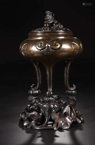 A BRONZE  LION CARVED TRI-POD CENSER