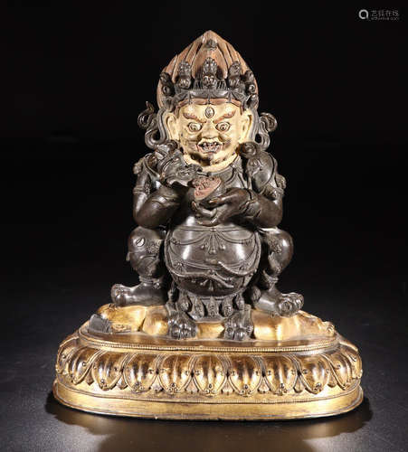 A PARTIAL GILT BRONZE MAHAKARA BUDDHA