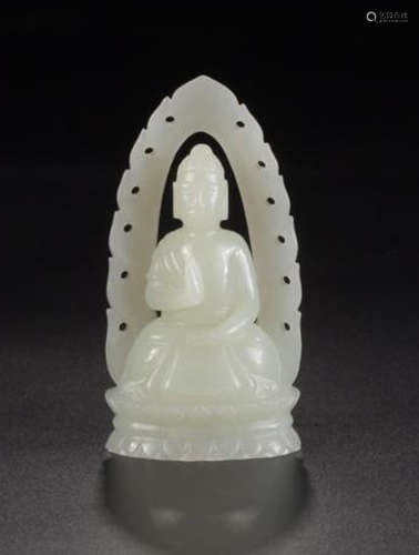 A HETIAN JADE FIGURE OF BUDDHA