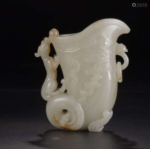 A HETIAN JADE AUSPICIOUS PATTERN CARVED CUP