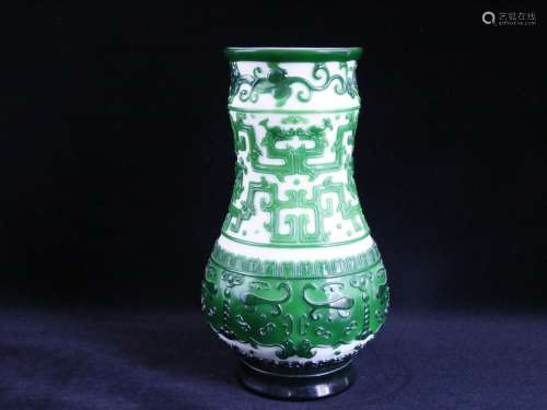 A Chinese Carved White and Green Peking Glass Vase