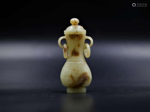 A Chinese Craved Jade Vase