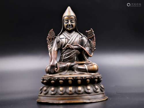 A Chinese Silver-Inlaid Bronze Buddha