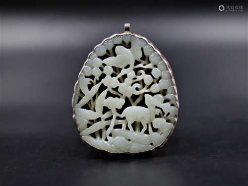 A Carved Jade Pendant