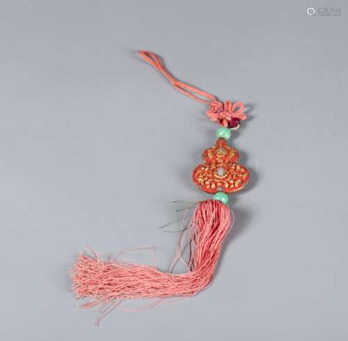 A Chinese Carved Cinnabar Double Gourd Pendant