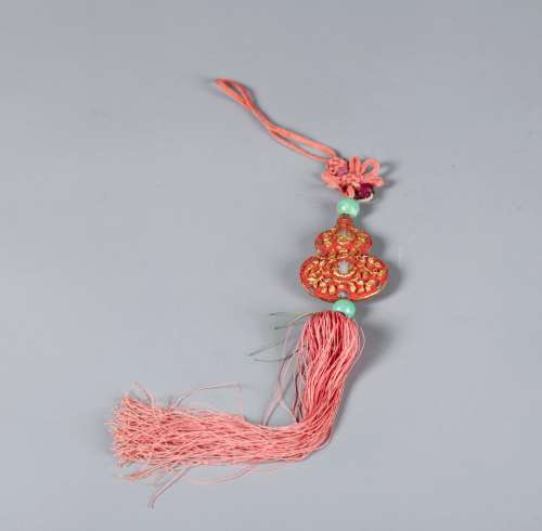 A Chinese Carved Cinnabar Double Gourd Pendant