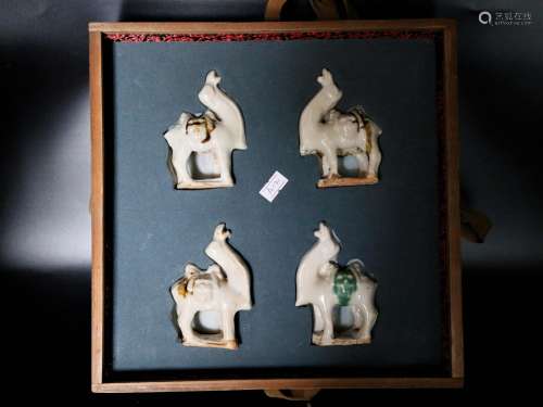 A Set of Four Chinese San-Cai Porcelain Camels