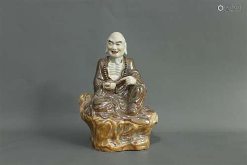 A Chinese Famille-Rose Porcelain Figure of Luohan