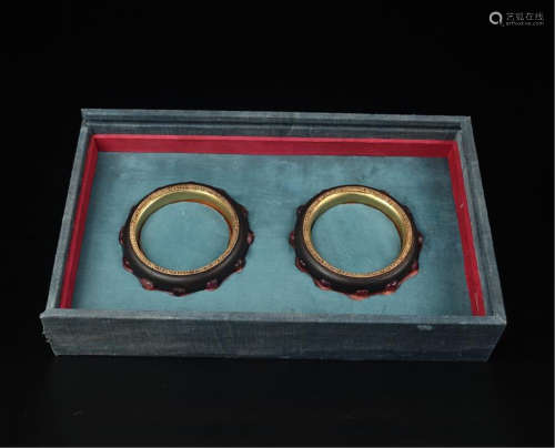 PAIR OF CHINESE RUBY INLAID AGALWOOD BANGLES