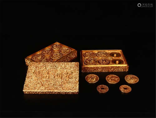 A SET OF CHINESE GILT BRONZE COINS IN CASE