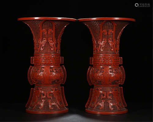 PAIR OF CHINESE CINNABAR DRAGON GU VASES