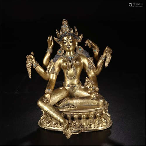 TIBETAN GILT BRONZE SEATED SIX ARM GUANYIN