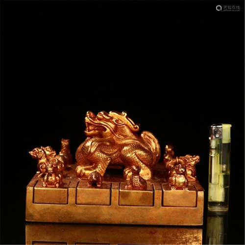 A NESTING CHINESE GILT BRONZE TWEELVE ZODIACAL ANIMALS SEAL